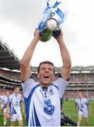 8 September 2013; Waterford captain Kevin Daly celebrates with the cup. Electric Ireland GAA Hurling All-Ireland Minor Championship Final, Galway v Waterford, Croke Park, Dublin. Picture credit: Barry Cregg / SPORTSFILE