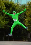 10 September 2013; Gordon Harford, from Naas, Co. Kildare, warms up before the Grant Thornton 5k Corporate Team Challenge 2013. Dublin Docklands, Dublin. Photo by Sportsfile