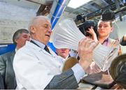 10 February 2012; Republic of Ireland manager Giovanni Trapattoni tries his skills at wedge cutting a the house of Waterford Crystal, The Mall, Waterford City. Picture credit: David Maher / SPORTSFILE