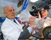 10 February 2012; Republic of Ireland manager Giovanni Trapattoni tries his skills at wedge cutting a the house of Waterford Crystal, The Mall, Waterford City. Picture credit: David Maher / SPORTSFILE