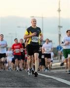 10 September 2013; Dave Gorman, running for Tech Group, in the Grant Thornton 5k Corporate Team Challenge 2013. Dublin Docklands, Dublin. Photo by Sportsfile