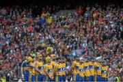 8 September 2013; Clare players stand for the national anthem. GAA Hurling All-Ireland Senior Championship Final, Cork v Clare, Croke Park, Dublin. Picture credit: Brian Lawless / SPORTSFILE