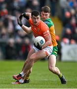 25 February 2024; Conor O'Neill of Armagh /ib Mark Curran of Donegal during the Allianz Football League Division 2 match between Armagh and Donegal at BOX-IT Athletic Grounds in Armagh. Photo by Brendan Moran/Sportsfile