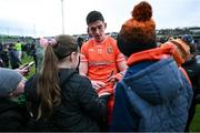 25 February 2024; Rory Grugan of Armagh signs autographs after the Allianz Football League Division 2 match between Armagh and Donegal at BOX-IT Athletic Grounds in Armagh. Photo by Brendan Moran/Sportsfile