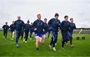 25 February 2024; The Monaghan team return to the dressing-room ahead of the Allianz Football League Division 1 match between Roscommon and Monaghan at Dr Hyde Park in Roscommon. Photo by Daire Brennan/Sportsfile