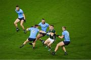 24 February 2024; Cillian Burke of Kerry is surrounded by Dublin players, from left, Theo Clancy, John Small, Seán MacMahon and Peadar O Cofaigh Byrne during the Allianz Football League Division 1 match between Dublin and Kerry at Croke Park in Dublin. Photo by Ray McManus/Sportsfile