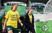 26 February 2024; The Ireland Women’s National Team is calling on fans to go all in against cancer this Daffodil Day, Friday 22nd March. Ahead of their international friendly against Wales on Tuesday at Tallaght Stadium, the Girls in Green turned yellow to show their support for the Irish Cancer Society’s Daffodil Day. There are lots of ways to get involved this Daffodil Day, visit cancer.ie to learn more. Daffodil Day takes place on Friday 22nd March. Whether you want to get involved with your school, company, or in your community, there are lots of ways to go all in and support cancer patients across Ireland. Visit cancer.ie to get involved or learn more. Anyone with questions or concerns about cancer can contact the Irish Cancer Society Support Line on Freephone 1800 200 700 or visit supportline@irishcancer.ie for more information. Pictured wearing the Daffidil day T-Shirts are Katie McCabe, left, and Jess Fitzgerald before a Republic of Ireland women training session at Tallaght Stadium in Dublin. Photo by Tyler Miller/Sportsfile