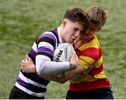 27 February 2024; Senan Gavin of Terenure College in action against Luke Rowlette of Temple Carrig School during the Bank of Ireland Leinster Schools Junior Cup quarter-final match between Terenure College and Temple Carrig School at Energia Park in Dublin. Photo by Piaras Ó Mídheach/Sportsfile