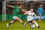 27 February 2024; Rachel Rowe of Wales in action against Jessica Ziu of Republic of Ireland during the international women's friendly match between Republic of Ireland and Wales at Tallaght Stadium in Dublin. Photo by Tyler Miller/Sportsfile