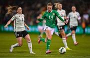 27 February 2024; Heather Payne of Republic of Ireland in action against Lily Woodham of Wales during the international women's friendly match between Republic of Ireland and Wales at Tallaght Stadium in Dublin. Photo by Tyler Miller/Sportsfile