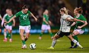 27 February 2024; Jessica Ziu of Republic of Ireland in action against Gemma Evans of Wales during the international women's friendly match between Republic of Ireland and Wales at Tallaght Stadium in Dublin. Photo by Tyler Miller/Sportsfile