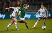 27 February 2024; Ruesha Littlejohn of Republic of Ireland in action against Angharad James of Wales during the international women's friendly match between Republic of Ireland and Wales at Tallaght Stadium in Dublin. Photo by David Fitzgerald/Sportsfile