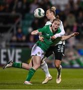 27 February 2024; Emily Murphy of Republic of Ireland is tackled by Rhiannon Roberts of Wales during the international women's friendly match between Republic of Ireland and Wales at Tallaght Stadium in Dublin. Photo by David Fitzgerald/Sportsfile