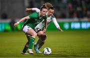 27 February 2024; Emily Murphy of Republic of Ireland in action against Ella Powell of Wales during the international women's friendly match between Republic of Ireland and Wales at Tallaght Stadium in Dublin. Photo by David Fitzgerald/Sportsfile