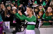 27 February 2024; Lily Agg of Republic of Ireland takes a selfie with supporters after the international women's friendly match between Republic of Ireland and Wales at Tallaght Stadium in Dublin. Photo by David Fitzgerald/Sportsfile