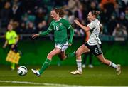 27 February 2024; Kyra Carusa of Republic of Ireland in action against Josie Green of Wales during the international women's friendly match between Republic of Ireland and Wales at Tallaght Stadium in Dublin. Photo by Tyler Miller/Sportsfile