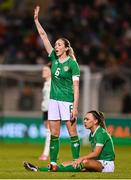 27 February 2024; Megan Connolly of Republic of Ireland, left, calls for medical treatment for team-mate Katie McCabe during the international women's friendly match between Republic of Ireland and Wales at Tallaght Stadium in Dublin. Photo by Tyler Miller/Sportsfile