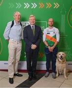 28 February 2024; French Ambassador to Ireland HE Vincent Guérend, centre, with Irish para-triathlete Donnacha McCarthy, right, and Dave Tilley, former coach of Donnacha McCarthy, at The Helix in DCU, Dublin, for Paralympics Ireland's '6 Months to Go' event ahead of the Paralympic Games 2024 in Paris, France. Photo by Seb Daly/Sportsfile
