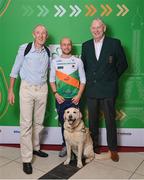 28 February 2024; Irish para-triathlete Donnacha McCarthy, centere, with his former coach Dave Tilley, left, and Swim Ireland president Joe Gavaghan at The Helix in DCU, Dublin, for Paralympics Ireland's '6 Months to Go' event ahead of the Paralympic Games 2024 in Paris, France. Photo by Seb Daly/Sportsfile