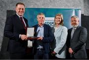 29 February 2024; Stephen Dargan of Carlow FC, Carlow, second left, receives his award from Minister of State for Sport and Physical Education Thomas Byrne TD, left, Federation of Irish Sport chair Clare McGrath, and Louth Sports Partnership and Louth County Council head of sport, Federation of Irish Sport board member and member of the Awards Judging Panel Graham Russell, right, during the Federation of Irish Sport Volunteers in Sport Awards at The Crowne Plaza Hotel in Blanchardstown, Dublin.  Photo by Seb Daly/Sportsfile