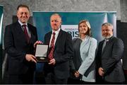 29 February 2024; Ian Ross of Enniskillen Rugby Club Fermanagh, second from left, receives his award from Minister of State for Sport and Physical Education Thomas Byrne TD, left, Federation of Irish Sport chair Clare McGrath, second from right, and Louth Sports Partnership and Louth County Council head of sport, Federation of Irish Sport board member and member of the Awards Judging Panel Graham Russell, during the Federation of Irish Sport Volunteers in Sport Awards at The Crowne Plaza Hotel in Blanchardstown, Dublin. Photo by Seb Daly/Sportsfile