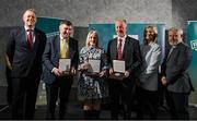 29 February 2024; Recipients, from second left, Tony Stephens of Claregalway GAA Club, Galway, Amanda Spencer of Jobstown Boxing Club Active, South Dublin, and Ian Ross of Enniskillen Rugby Club Fermanagh, receive their awards from Minister of State for Sport and Physical Education Thomas Byrne TD, left, Federation of Irish Sport chair Clare McGrath, second from right, and Louth Sports Partnership and Louth County Council head of sport, Federation of Irish Sport board member and member of the Awards Judging Panel Graham Russell, during the Federation of Irish Sport Volunteers in Sport Awards at The Crowne Plaza Hotel in Blanchardstown, Dublin. Photo by Seb Daly/Sportsfile