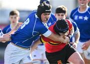 29 February 2024; Eoghan Brady of St Mary’s College is tackled by Ben Finnie of CBC Monkstown during the Bank of Ireland Leinster Schools Junior Cup quarter-final match between St Mary's College and CBC Monkstown at Energia Park in Dublin. Photo by Daire Brennan/Sportsfile