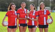 29 February 2024; MTU Cork players, from left, Caitlin O'Mahony of MTU Cork, Katie O'Driscoll of MTU Cork, Ellen Maguire of MTU Cork and Eimear Boland of MTU Cork with the Lynch Cup during the LGFA Higher Education Football Championships Captains Day at MTU Cork. Photo by Brendan Moran/Sportsfile