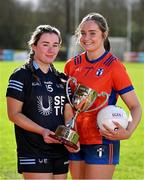 29 February 2024; Anna O'Dea of SETU Waterford, left, and Sophie Hennessy of MICL with the Moynihan Cup during the LGFA Higher Education Football Championships Captains Day at MTU Cork. Photo by Brendan Moran/Sportsfile