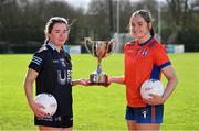 29 February 2024; Anna O'Dea of SETU Waterford, left, and Sophie Hennessy of MICL with the Moynihan Cup during the LGFA Higher Education Football Championships Captains Day at MTU Cork. Photo by Brendan Moran/Sportsfile