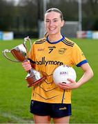 29 February 2024; Hannah McHugh of DCU with the Lagan Cup during the LGFA Higher Education Football Championships Captains Day at MTU Cork. Photo by Brendan Moran/Sportsfile