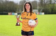 29 February 2024; Louise Pearl of DCU with the HEC Cup during the LGFA Higher Education Football Championships Captains Day at MTU Cork. Photo by Brendan Moran/Sportsfile