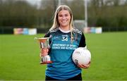 29 February 2024; Becky Doran of Maynooth University with the Donaghy Cup during the LGFA Higher Education Football Championships Captains Day at MTU Cork. Photo by Brendan Moran/Sportsfile