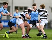 29 February 2024; Evan Ryan of Belvedere College is tackled by Herbie Boyle of St Michael’s College during the Bank of Ireland Leinster Schools Junior Cup quarter-final match between St Michael's College and Belvedere College at Energia Park in Dublin. Photo by Daire Brennan/Sportsfile