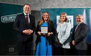 29 February 2024; Ruth McDonagh of Bray Hockey Club, Wicklow, second from left, receives her award from Minister of State for Sport and Physical Education Thomas Byrne TD, left, Federation of Irish Sport chair Clare McGrath, second from right, and Louth Sports Partnership and Louth County Council head of sport, Federation of Irish Sport board member and member of the Awards Judging Panel Graham Russell, during the Federation of Irish Sport Volunteers in Sport Awards at The Crowne Plaza Hotel in Blanchardstown, Dublin. Photo by Seb Daly/Sportsfile