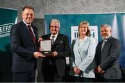 29 February 2024; John Corboy of Birr Town FC, Offaly, second from left, receives his award from Minister of State for Sport and Physical Education Thomas Byrne TD, left, Federation of Irish Sport chair Clare McGrath, second from right, and Louth Sports Partnership and Louth County Council head of sport, Federation of Irish Sport board member and member of the Awards Judging Panel Graham Russell, during the Federation of Irish Sport Volunteers in Sport Awards at The Crowne Plaza Hotel in Blanchardstown, Dublin. Photo by Seb Daly/Sportsfile