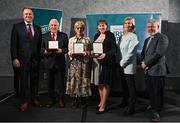 29 February 2024; Recipients, from second left, Jackie  Byrne of Mountrath St. Fintan's GAA, Laois, Mary McMorrow of Manorhamilton Community Tennis Club, Leitrim and Wanda Dwane of Mungret St Paul's GAA Club, Limerick, receives their awards from Minister of State for Sport and Physical Education Thomas Byrne TD, left, Federation of Irish Sport chair Clare McGrath, second from right, and Louth Sports Partnership and Louth County Council head of sport, Federation of Irish Sport board member and member of the Awards Judging Panel Graham Russell, during the Federation of Irish Sport Volunteers in Sport Awards at The Crowne Plaza Hotel in Blanchardstown, Dublin. Photo by Seb Daly/Sportsfile