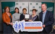 29 February 2024; Award winner Sally Kavanagh of Waterford Hockey Club, Waterford, second from right, with, from left, Rosarie Kealy of Waterford Sports Partnership, Patricia O'Hara of Waterford Hockey Club, her sister Anne Marie Kavanagh, and Terry Hayes, chair of Waterford Sports Partnership, during the Federation of Irish Sport Volunteers in Sport Awards at The Crowne Plaza Hotel in Blanchardstown, Dublin. Photo by Seb Daly/Sportsfile