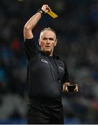 24 February 2024; Referee Conor Lane issues a yellow card during the Allianz Football League Division 1 match between Dublin and Kerry at Croke Park in Dublin. Photo by Brendan Moran/Sportsfile