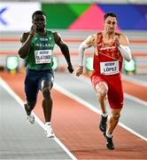1 March 2024; Israel Olatunde of Ireland, left, and Sergio López of Spain during their heat of the Men's 60m during day one of the World Indoor Athletics Championships 2024 at Emirates Arena in Glasgow, Scotland. Photo by Sam Barnes/Sportsfile