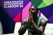 1 March 2024; Israel Olatunde of Ireland reacts after his heat of the Men's 60m during day one of the World Indoor Athletics Championships 2024 at Emirates Arena in Glasgow, Scotland. Photo by Sam Barnes/Sportsfile