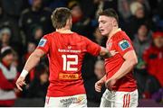 1 March 2024; Ruadhán Quinn of Munster is congratulated by team mate Alex Nankivell after scoring their side's first try during the United Rugby Championship match between Munster and Zebre Parma at Virgin Media Park in Cork. Photo by Brendan Moran/Sportsfile