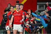 1 March 2024; Mike Haley of Munster celebrates with team mate Gavin Coombes and Antoine Frisch, left, after scoring their side's second try during the United Rugby Championship match between Munster and Zebre Parma at Virgin Media Park in Cork. Photo by Brendan Moran/Sportsfile