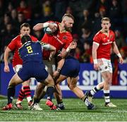 1 March 2024; RG Snyman of Munster is tackled by Luca Bigi, left, and Luca Rizzoli of Zebre Parma during the United Rugby Championship match between Munster and Zebre Parma at Virgin Media Park in Cork. Photo by Brendan Moran/Sportsfile