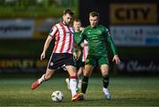 1 March 2024; Will Patching of Derry City in action against Jamie Lennon of St Patrick's Athletic during the SSE Airtricity Men's Premier Division match between Derry City and St Patrick's Athletic at The Ryan McBride Brandywell Stadium in Derry. Photo by Ben McShane/Sportsfile