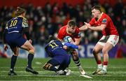 1 March 2024; Alex Kendellen of Munster is tackled by Simone Gesi of Zebre Parma during the United Rugby Championship match between Munster and Zebre Parma at Virgin Media Park in Cork. Photo by Brendan Moran/Sportsfile