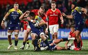1 March 2024; Muhamed Hasa of Zebre Parma is tackled by RG Snyman of Munster during the United Rugby Championship match between Munster and Zebre Parma at Virgin Media Park in Cork. Photo by Brendan Moran/Sportsfile