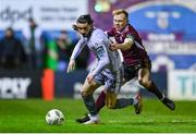 1 March 2024; Connor Parsons of Waterford in action against Conor McCormack of Galway United during the SSE Airtricity Men's Premier Division match between Galway United and Waterford at Eamonn Deacy Park in Galway. Photo by Tyler Miller/Sportsfile