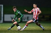 1 March 2024; Carl Axel Sjoberg of St Patrick's Athletic in action against Michael Duffy of Derry City during the SSE Airtricity Men's Premier Division match between Derry City and St Patrick's Athletic at The Ryan McBride Brandywell Stadium in Derry. Photo by Ben McShane/Sportsfile