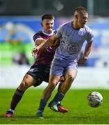 1 March 2024; Niall O'Keeffe of Waterford in action against Regan Donelon of Galway United during the SSE Airtricity Men's Premier Division match between Galway United and Waterford at Eamonn Deacy Park in Galway. Photo by Tyler Miller/Sportsfile